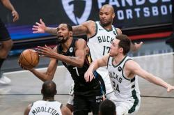 九游体育官网入口-篮网队员联手发威，维持不败记录